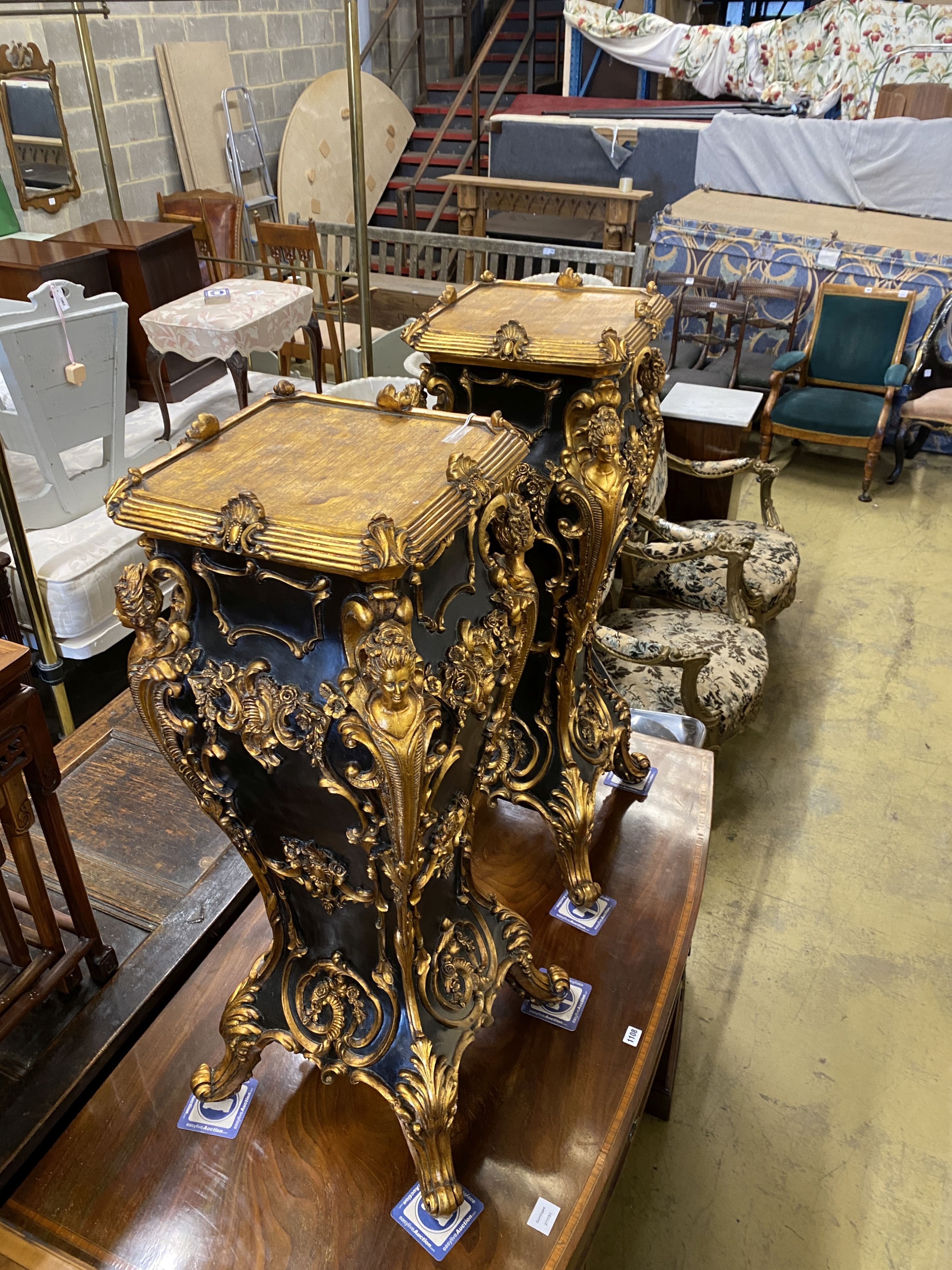 A pair of painted metal 18th century style pedestals, width 35cm, height 104cm